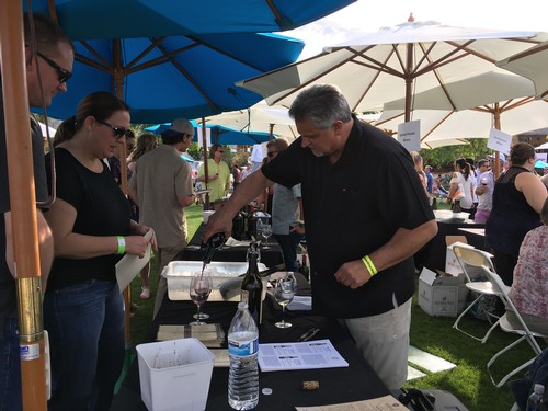 Pouring wine at Ranhco Mirage Food and Wine Festival